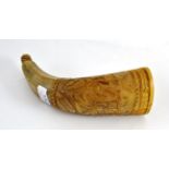 Cow horn, probably German, carved with a horse, flowers and a coat of arms in low relief, with