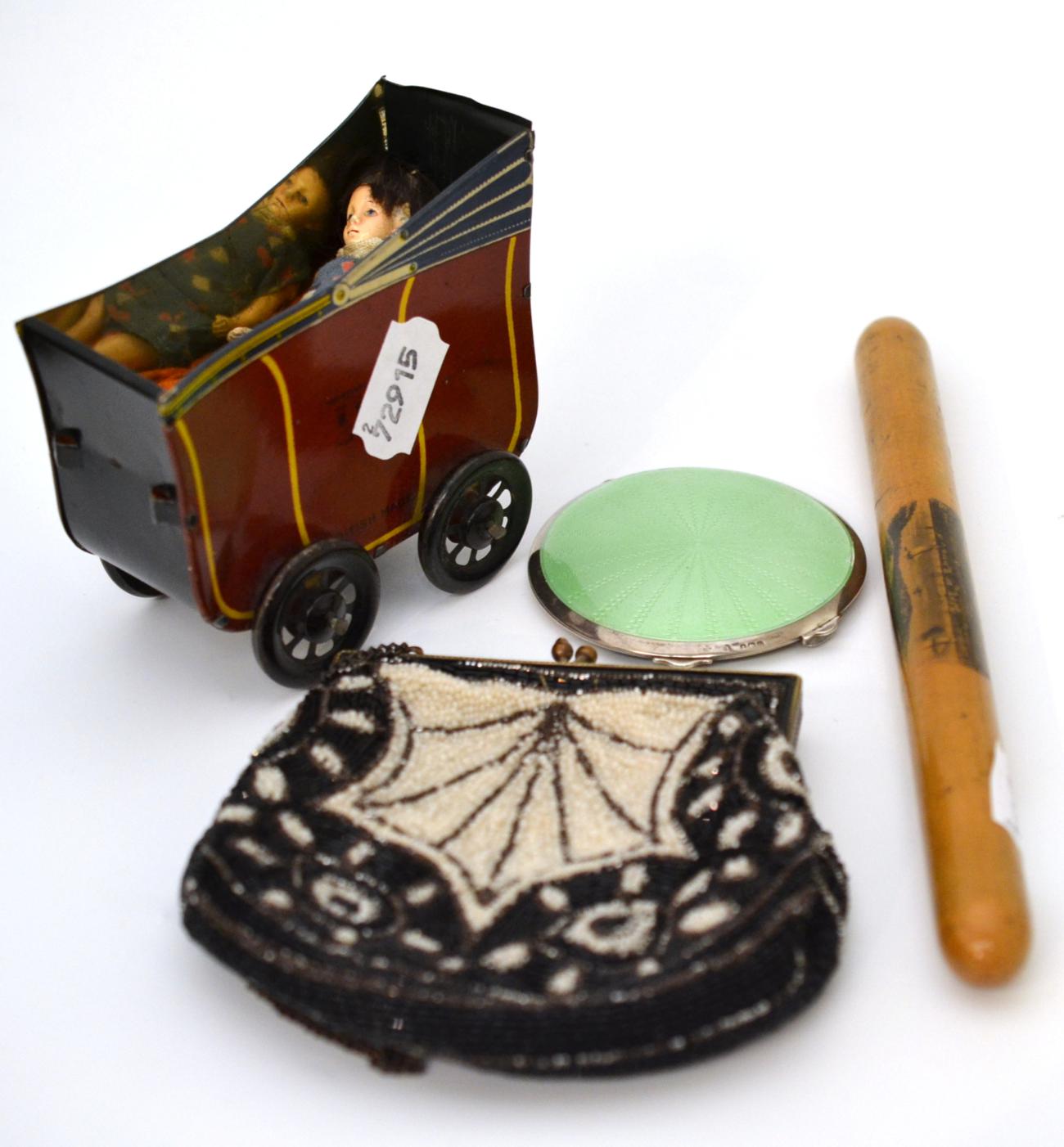 Tin plate perambulator and doll, Victorian purse, Mauchline ware needle case and silver compact