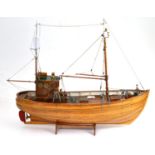 A scratch built model of a trawler, fitted with assorted lamps and accessories to the deck and a