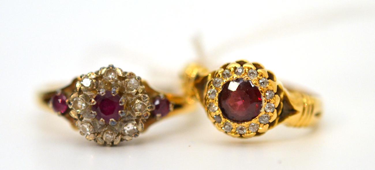 An 18ct gold ruby and diamond cluster ring and a 9ct gold ruby and diamond cluster ring (2)