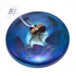 A John Ditchfield glass form paperweight with silver dragonfly