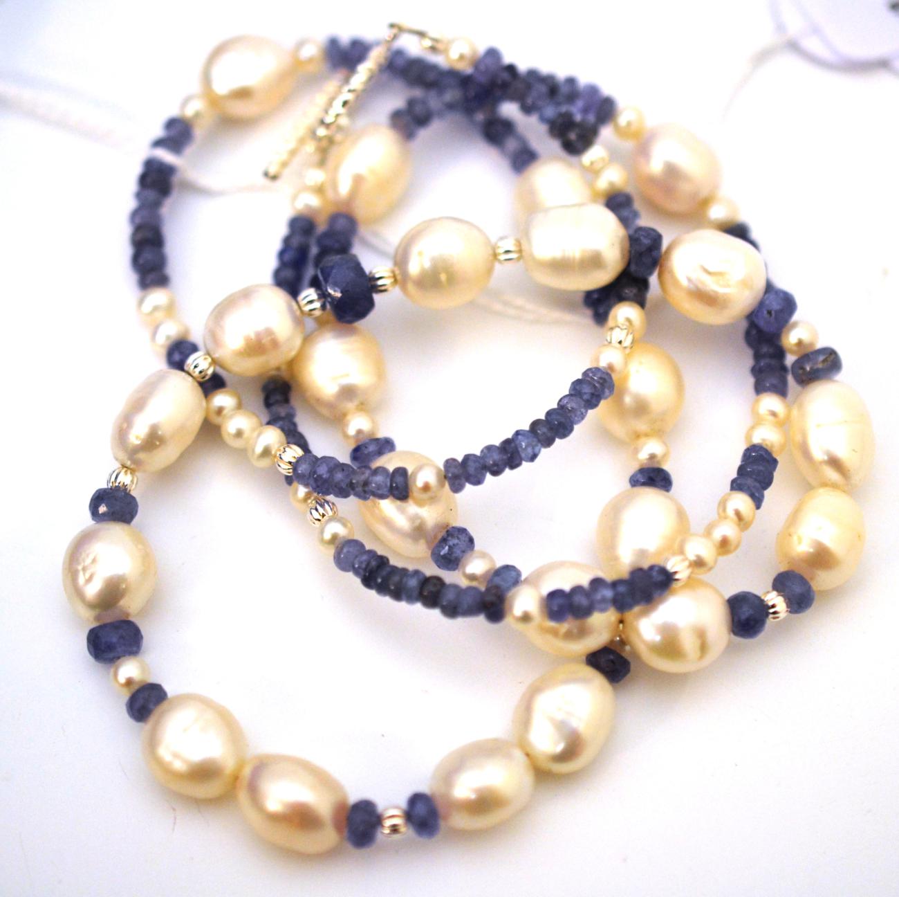 A tanzanite and cultured pearl necklace