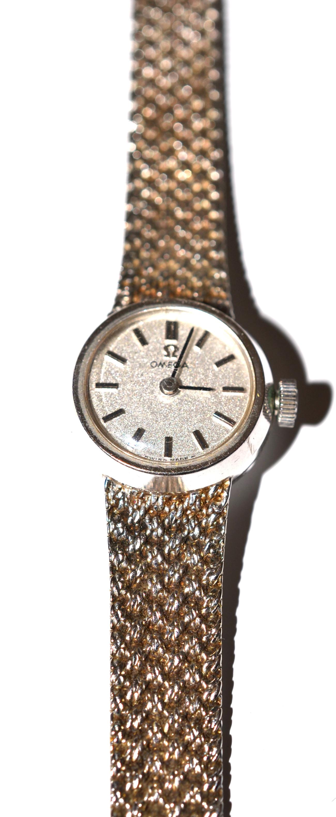 A lady's Omega wristwatch with 9ct white gold strap