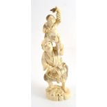 A late 19th century Japanese ivory okimono, 22cm high