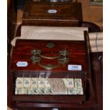 Victorian parquetry decorated tea caddy, a Mah Jong set, a small quantity of coins and a pair of