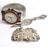 Silver trowel bookmark, watch and decanter label