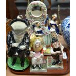A tray including sponge decorated toby jug, a pair of pearlware figures and a Staffordshire flatback