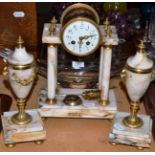 French gilt metal and brown onyx clock garniture