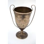 A silver trophy cup