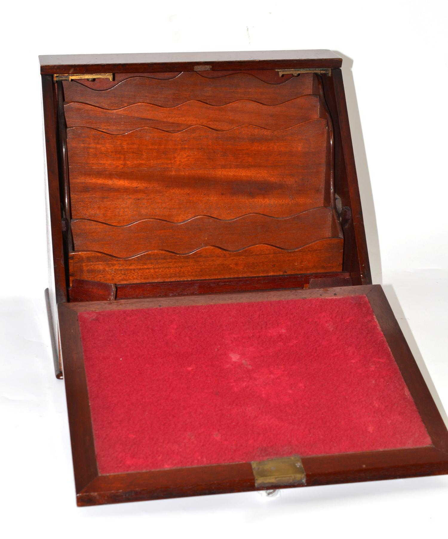 A late Victorian mahogany correspondence cabinet with fall front