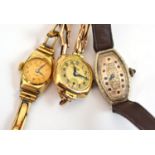 A lady's wristwatch stamped '14k' and two lady's wristwatches stamped '375'