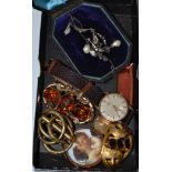 Three gilt brooches, a locket, a scent bottle, two paste necklaces and a Smiths watch