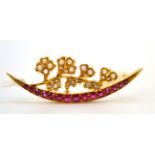 A ruby, seed pearl and diamond crescent brooch