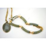 A jade bracelet and a jade pendant on 9ct gold chain