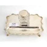 Silver inkstand with a bottle