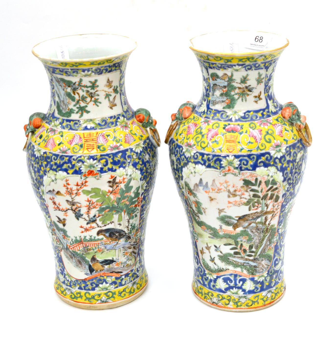 Pair of 19th century famille rose yellow ground baluster vases, 34cm high