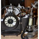 An onyx and chrome plated telephone, French style clock and a Mayfair fine bone china tea and coffee