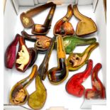 Eight Cased Meerschaum Pipes, including a figural rams head, a gun dog, lady in hat, naked lady,