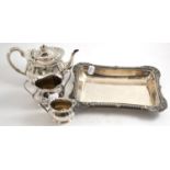 Three piece silver tea set and a plated entree dish stand  25.12ozt gross