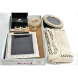 Two silver photograph frames, pair of Swarovski crystal earrings, beaded bag and other items