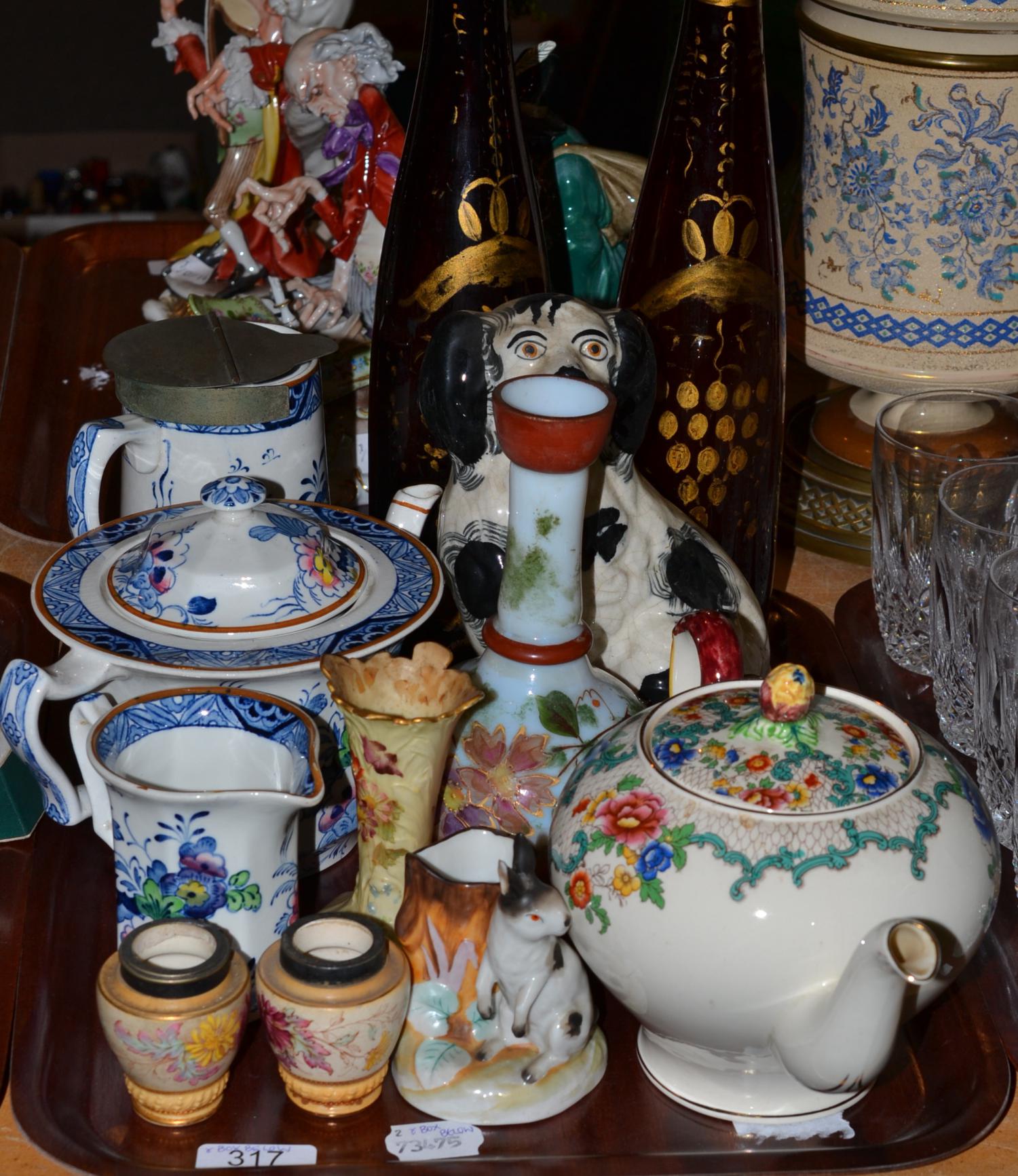 Two gilt decorated brown bottles, Royal Worcester spill vase, pair of rabbit spill vases, pottery