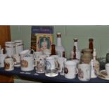 Assorted commemorative/souvenir wares including Bells whisky decanters etc