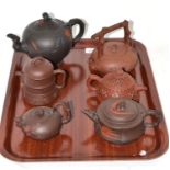 Six Chinese Yixing teapots with lids