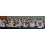 A large quantity of assorted Coalport characters, The Snowman figure groups, two Doulton examples