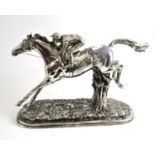 A silvered model of a horse and jockey