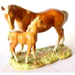 Beswick 'Mare and Foal' on base, model No. 953, second version, palomino gloss  (a.f.) Heavy crazing