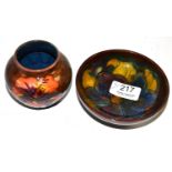 A Moorcroft pottery small vase and a dish  Dish - 11.5cm diameter, several light scratches and wear.