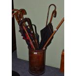 Leather stick stand, umbrellas and sticks