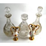 Pair of Edwardian cut glass decanters and stoppers, another single example and two French