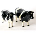 Beswick Friesian Bull, 'Ch. Coddington Hilt Bar', model No. 1439A; Beswick Friesian Cow, 'Ch.