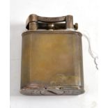 Dunhill table lighter in a silver plated engine turned case, patent no 390107 8cm by 10.5cm.