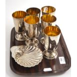 A set of six silver goblets and a silver shell dish 30.68ozt gross