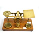 Set of brass postal scales and weights