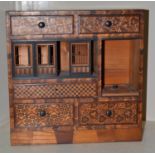 A Japanese inlaid table cabinet