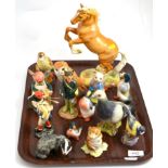A collection of Beswick including a rearing horse, 1014, assorted storybook figures including