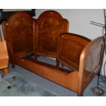 A pair of late 19th century walnut bed ends