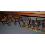 Two country stools, child's ebonised balloon back chair, brass fender, two coal hods, modern table