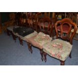 A set of four Victorian mahogany dining chairs, a 19th century carver on later castors and a