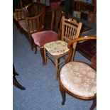 An Edwardian mahogany inlaid settee, two bedroom chairs and four dining chairs