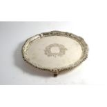 An Edwardian Silver Salver, Josiah Williams & Co, London 1906, with a gadrooned border and rococo