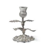 A Victorian Scottish Cast Silver Candlestick, T Smith & Son, Glasgow 1894, the rocky base