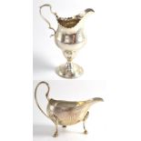 A George III Silver Helmet Shaped Cream Jug, maker's mark worn, London 1786, 13.5cm high; and A