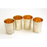 Four Modern Silver Beakers, Barry Brook, Sheffield 2002, circular with a gilt interior, 10cm high,