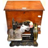 A Victorian Cast Iron Free Standing 'Princess of Wales' Sewing Machine, in black with gilt