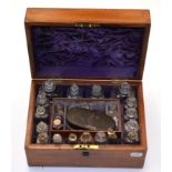 Apothecary Chest containing twenty four glass bottles in fitted and lined mahogany case with brass