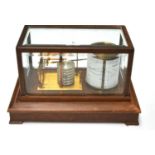 Barograph in glazed case with bevelled glass and drawer for additional charts, with seven vacuum